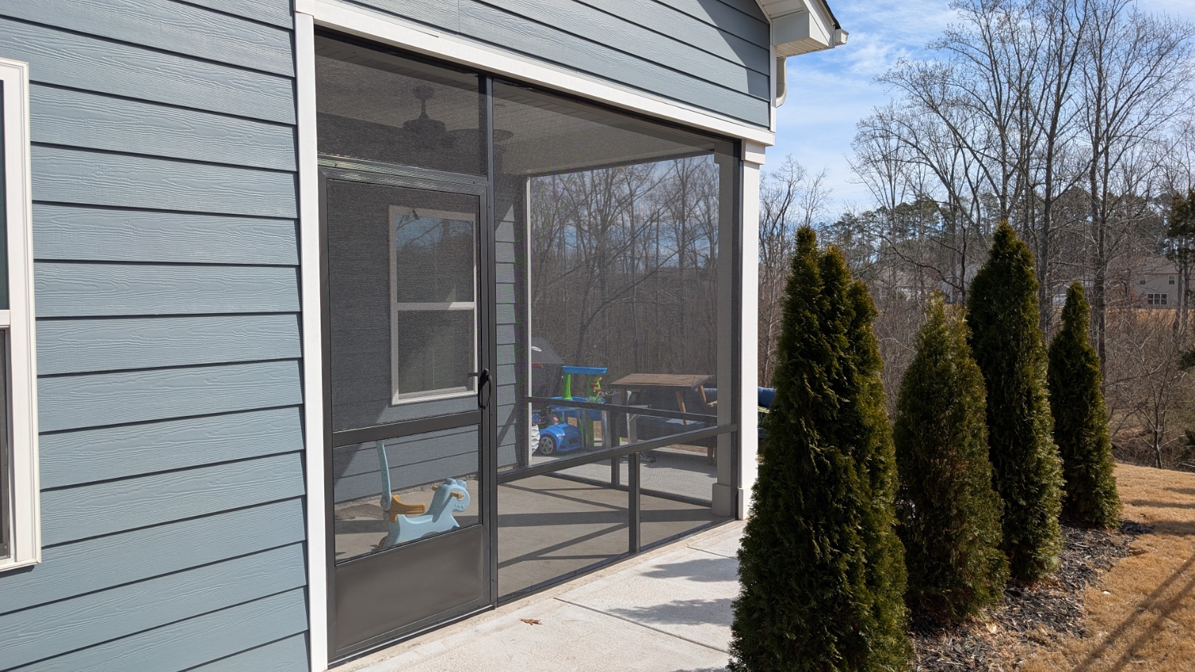 Screened Porch: Screened patio with heavy-duty door in LANCASTER, SC